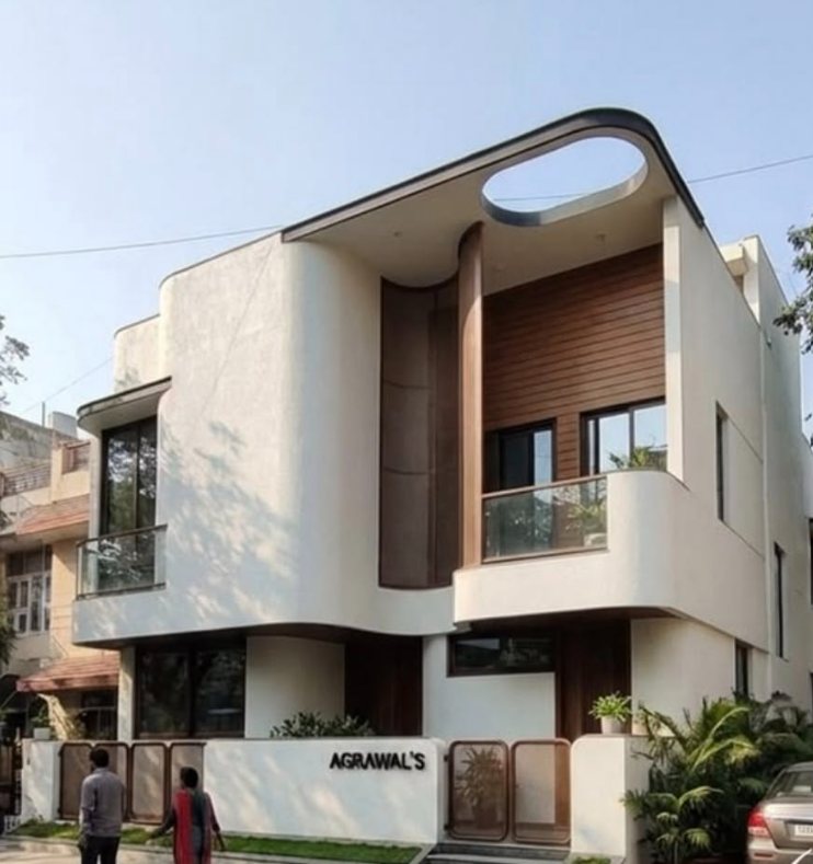 Sculpted villa facade, built residence