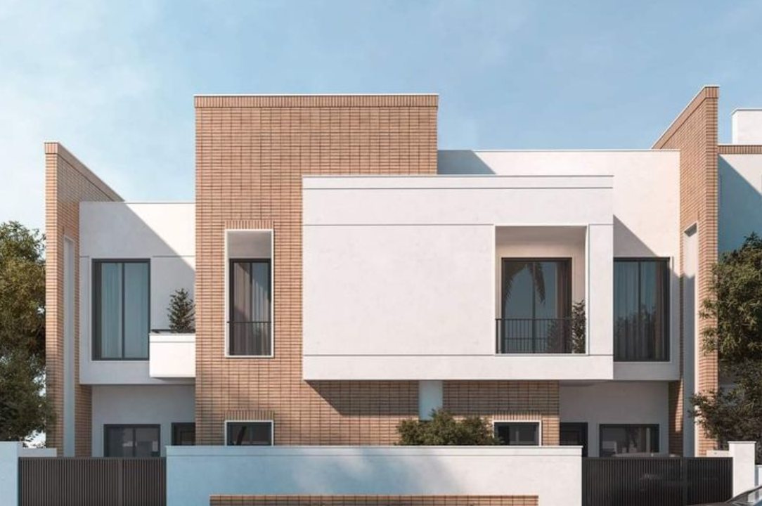 Twin villas in brick and lime palette